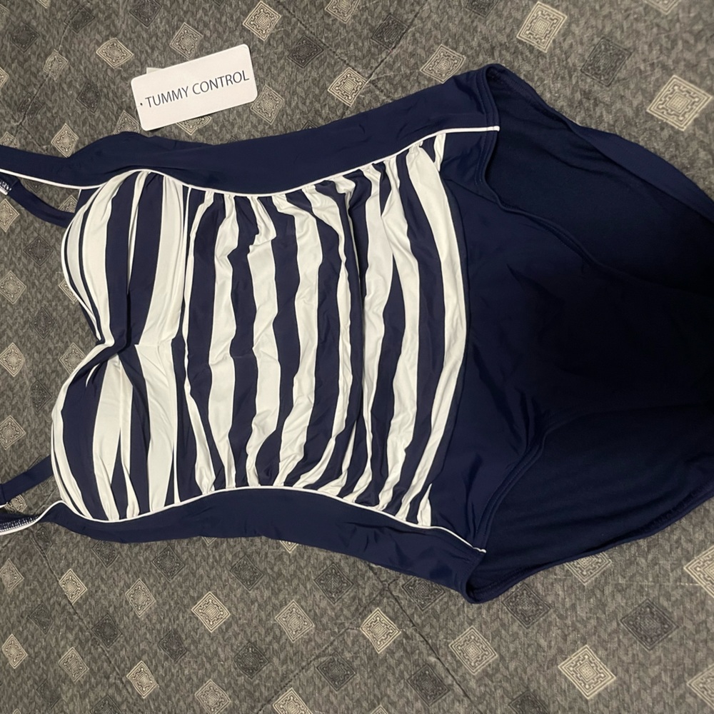 One pice size 10 Navy Blue and White. Brand Togs from Australia